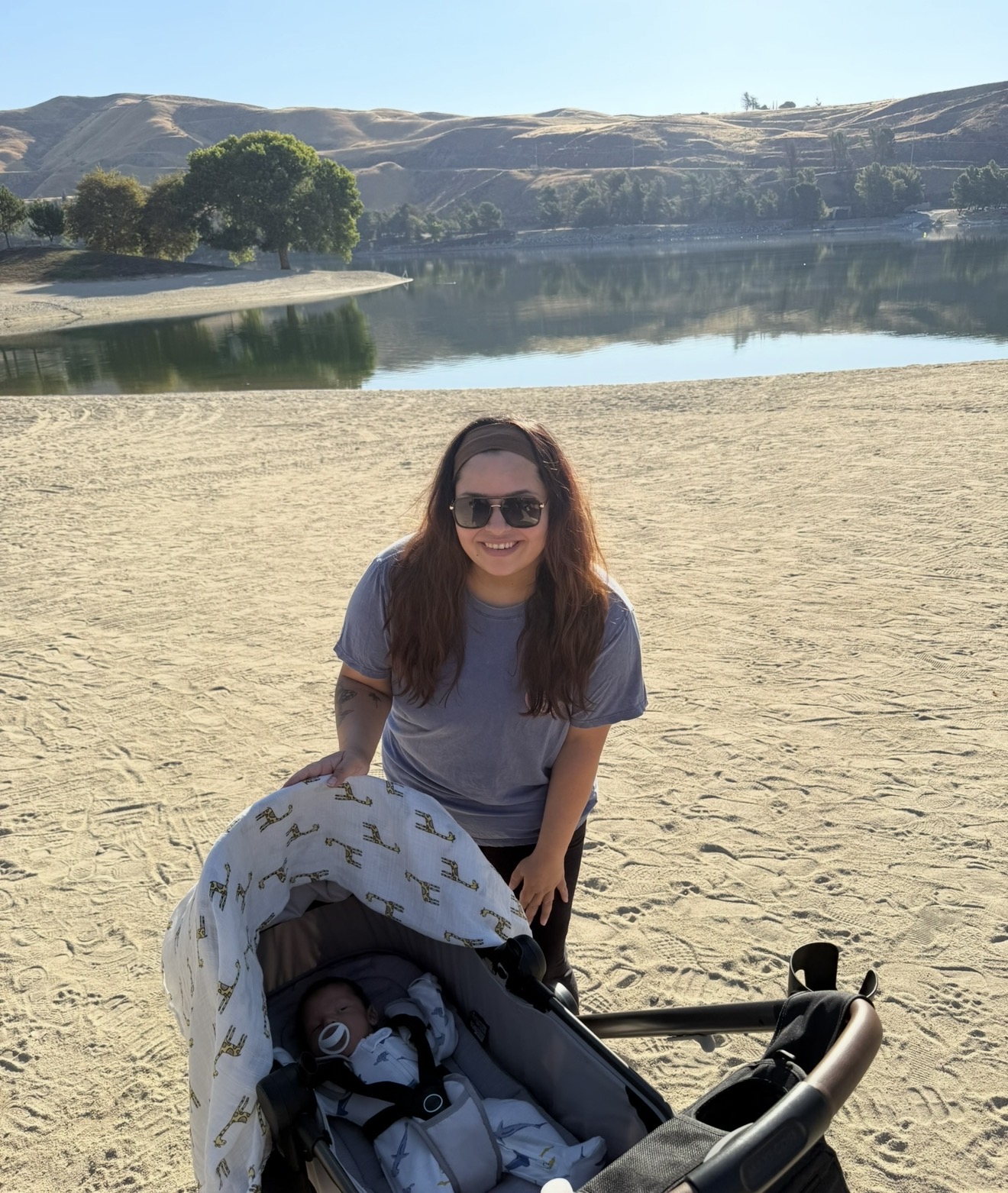Mom and baby on a morning walk around the lake near our house